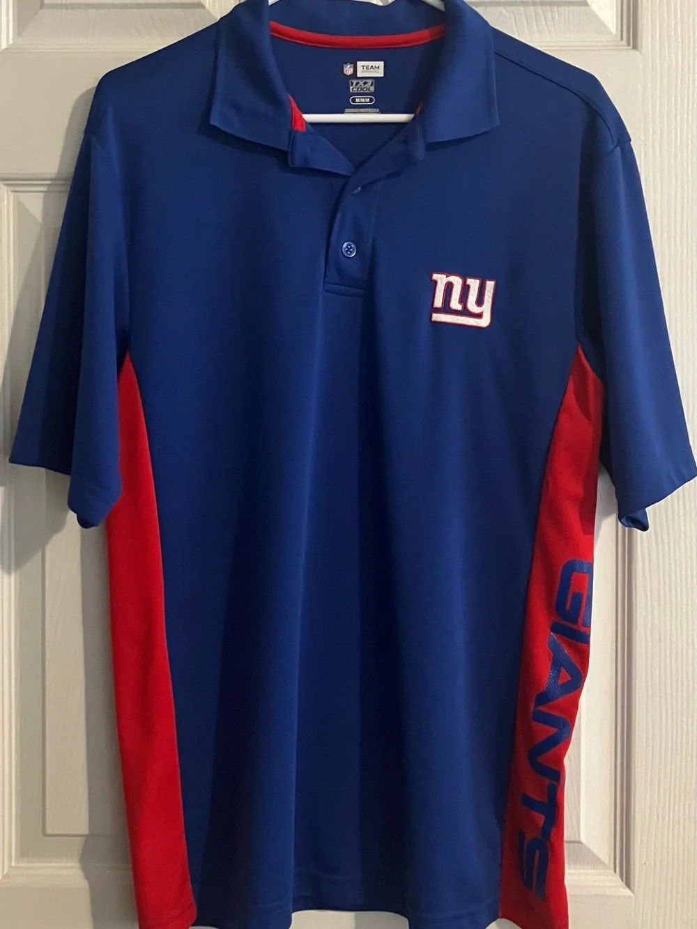 Youth New York Giant’s Royal Blue Polo with Red Side Panels Size M